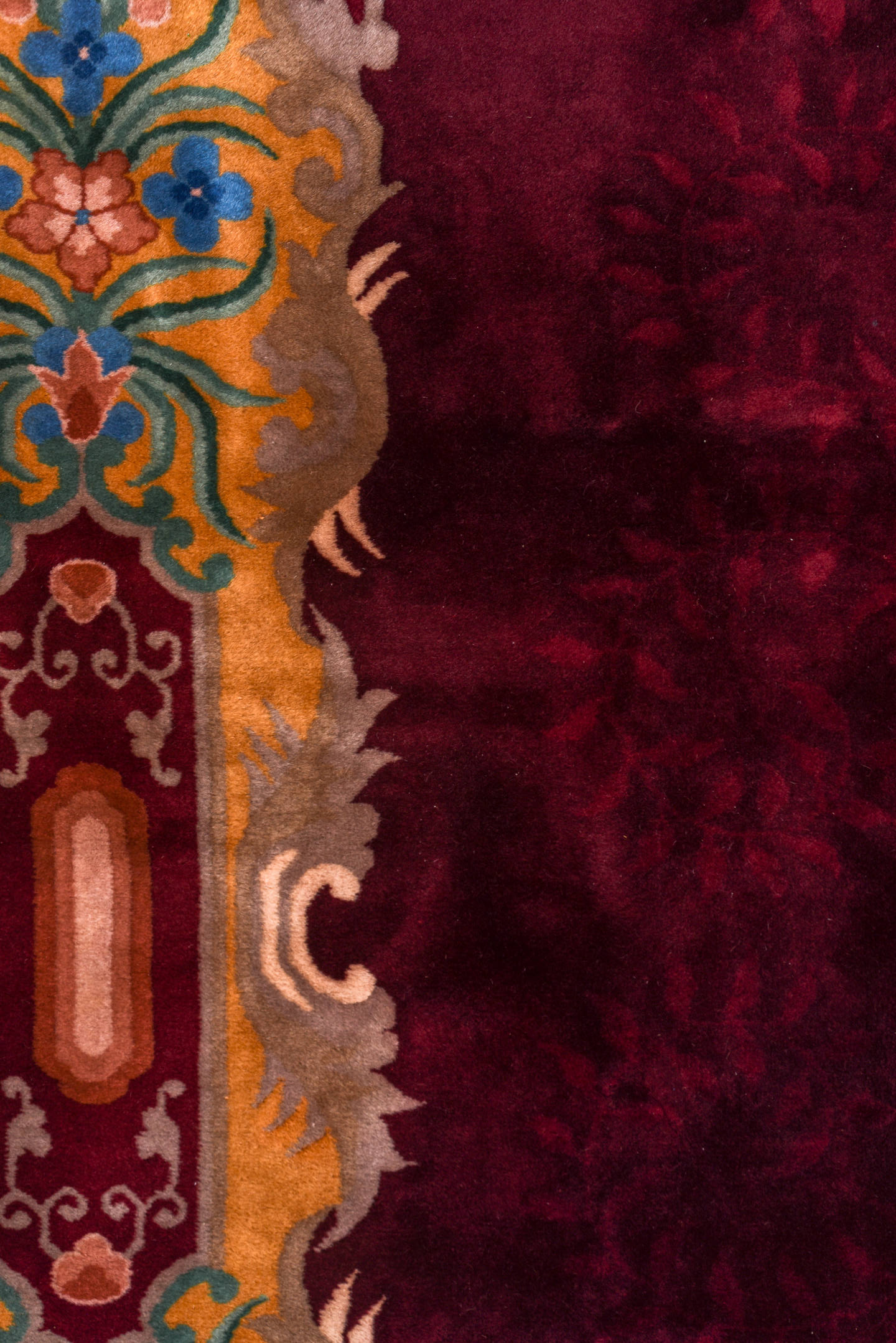 10' x 17' one-of-a-kind handmade antique Chinese rug. Color palette: burgundy, gold, ivory, blue, rose, taupe, pink, red