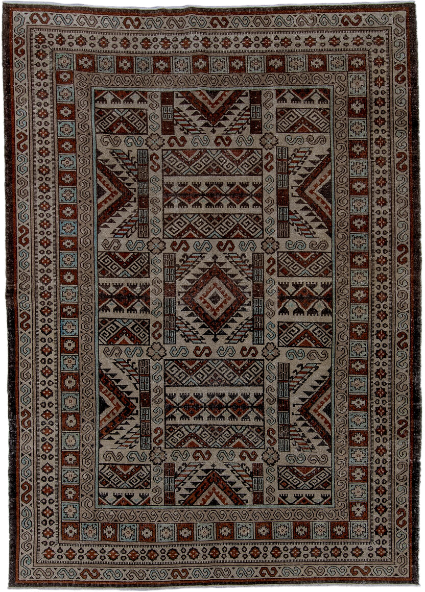 6' x 8' one-of-a-kind handmade antique Khotan medium size rug. Color palette: ivory, rust, brown, pale_blue, charcoal, taupe