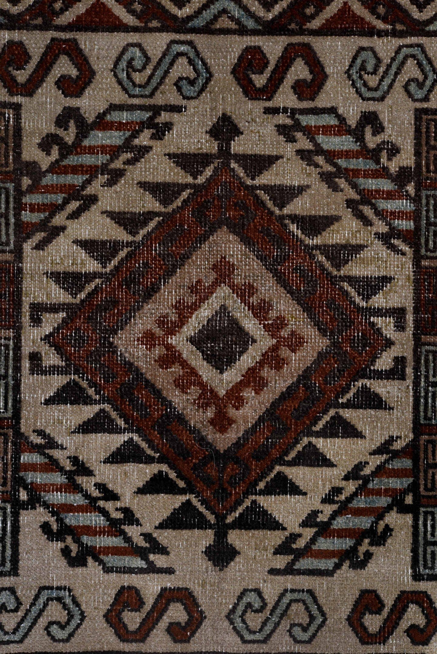 6' x 8' one-of-a-kind handmade antique Khotan medium size rug. Color palette: ivory, rust, brown, pale_blue, charcoal, taupe
