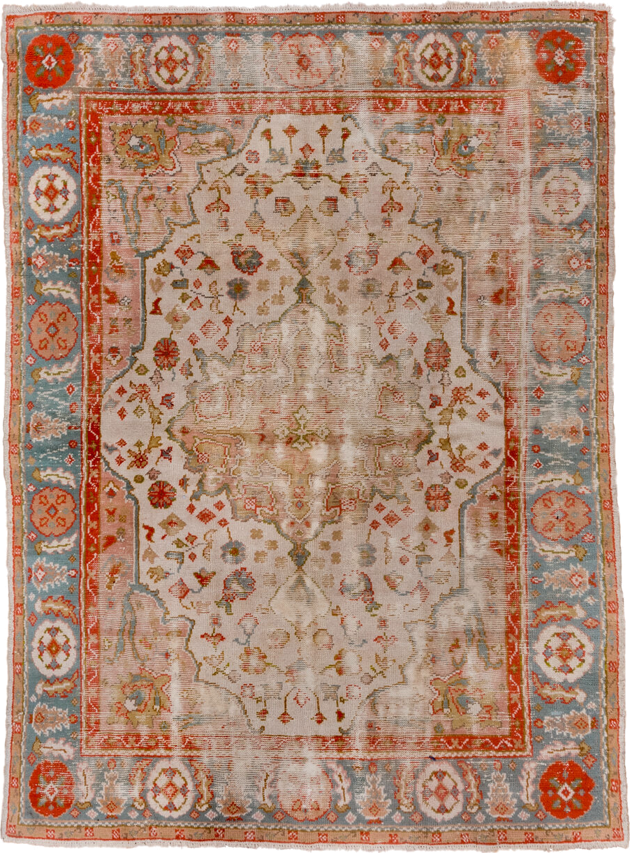 7' x 9' one-of-a-kind handmade antique Oushak rug. Color palette: ivory, powder_blue, coral, taupe, muted_gold, sage