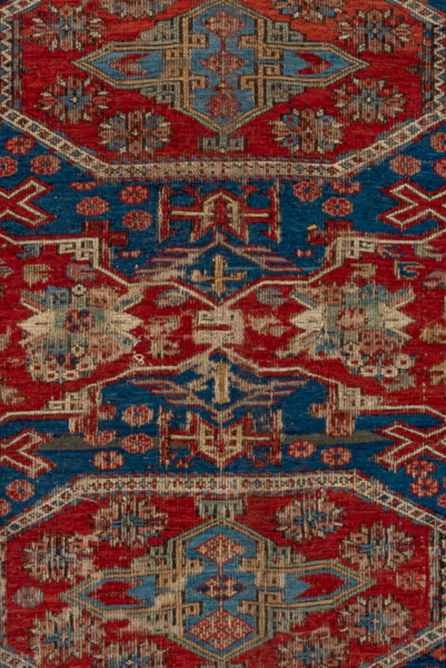 8' x 9' one-of-a-kind handmade antique Sumak rug. Color palette: rust, navy, ivory, sky blue, camel, crimson, terracotta