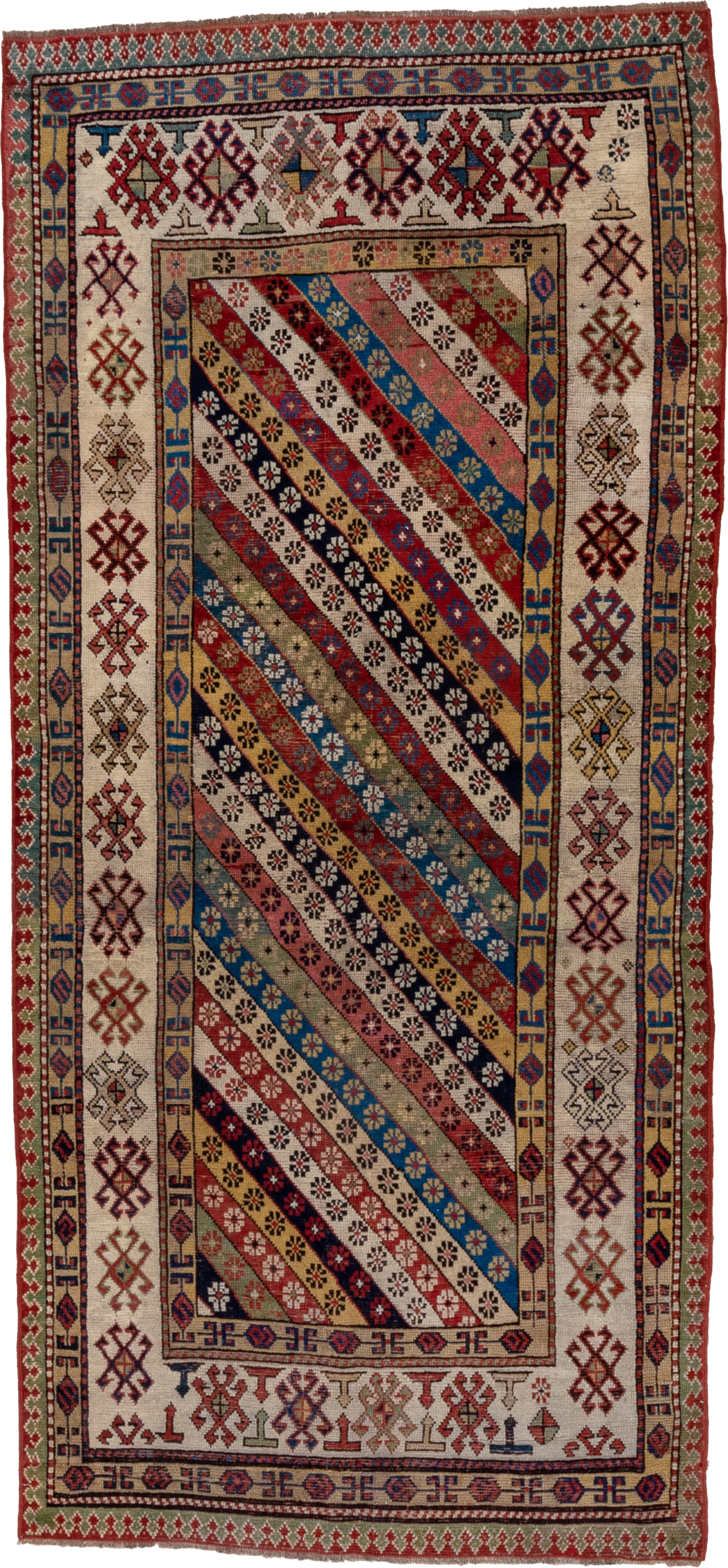 4' x 8' one-of-a-kind handmade antique Caucasian runner rug. Color palette: ivory, rust, indigo, camel, rose, navy, sage