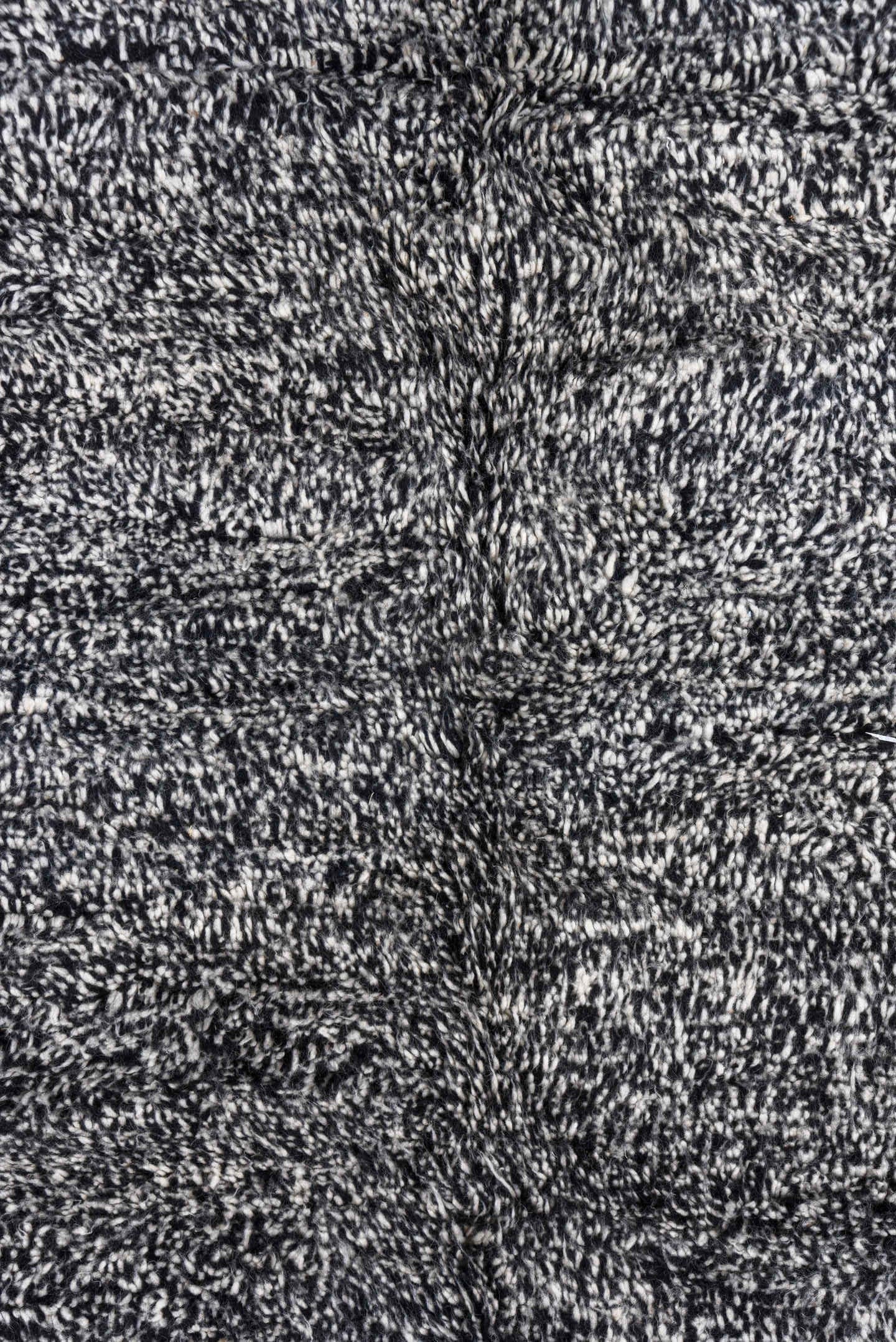 5' x 7' one-of-a-kind handmade vintage Moroccan rug. Color palette: charcoal, ivory, black, cream, gray