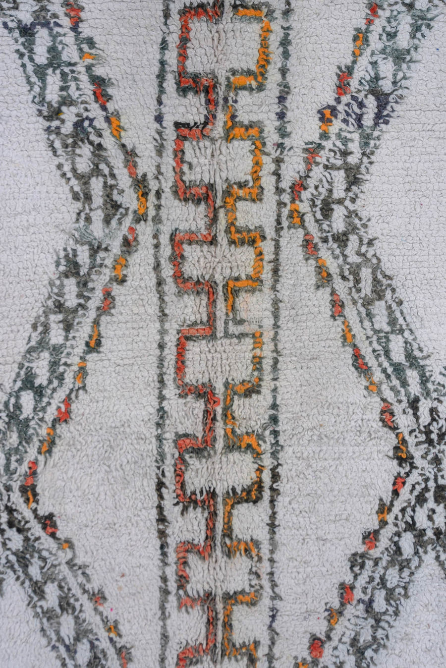 5' x 8' one-of-a-kind handmade vintage Moroccan medium size rug. Color palette: ivory, charcoal, rust, saffron, gray, black