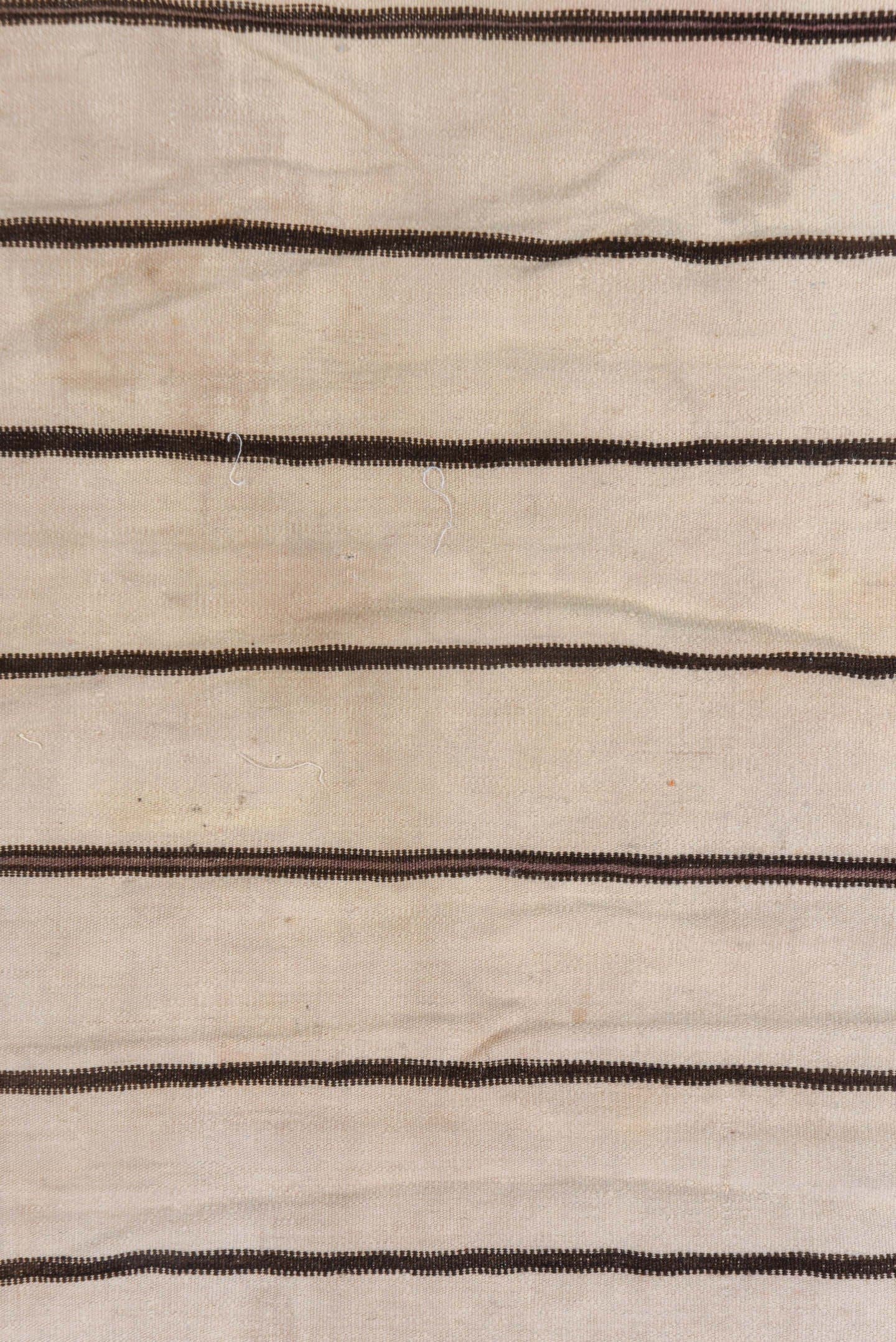 2' x 3' one-of-a-kind handmade vintage Textile small size rug. Color palette: ivory, charcoal, cream, taupe, gray, black