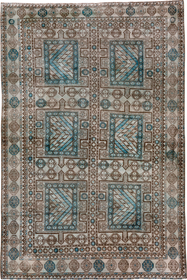 6' x 9' one-of-a-kind handmade vintage Turkish medium size rug. Color palette: ivory, brown, sky_blue, taupe, camel