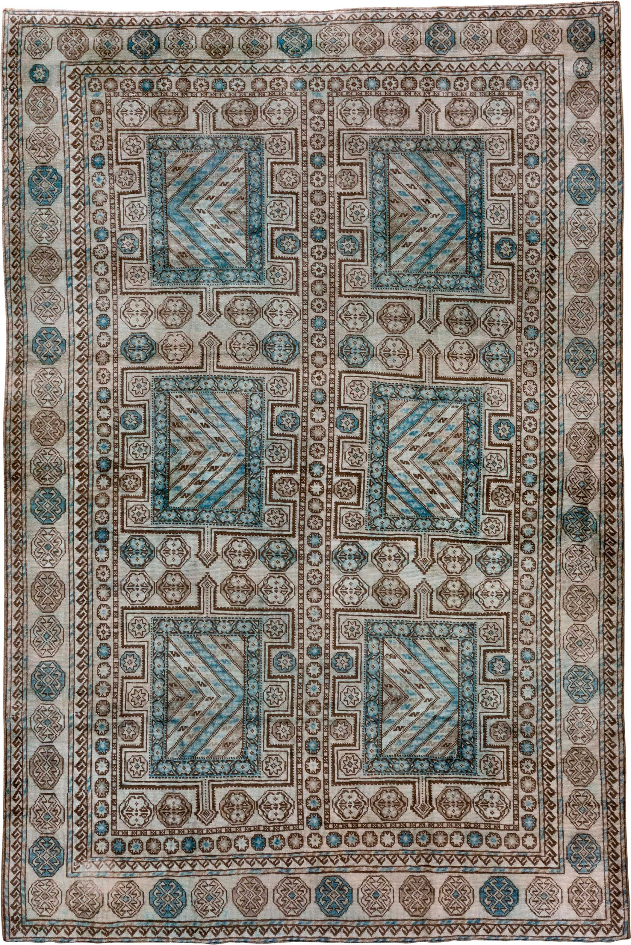 6' x 9' one-of-a-kind handmade vintage Turkish medium size rug. Color palette: ivory, brown, sky_blue, taupe, camel