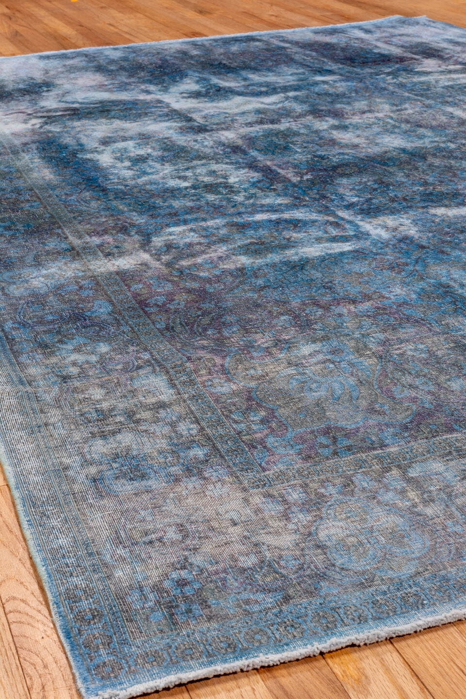 5' x 9' one-of-a-kind handmade antique Overdyed medium size rug. Color palette: sky blue, azure, slate, indigo, lavender