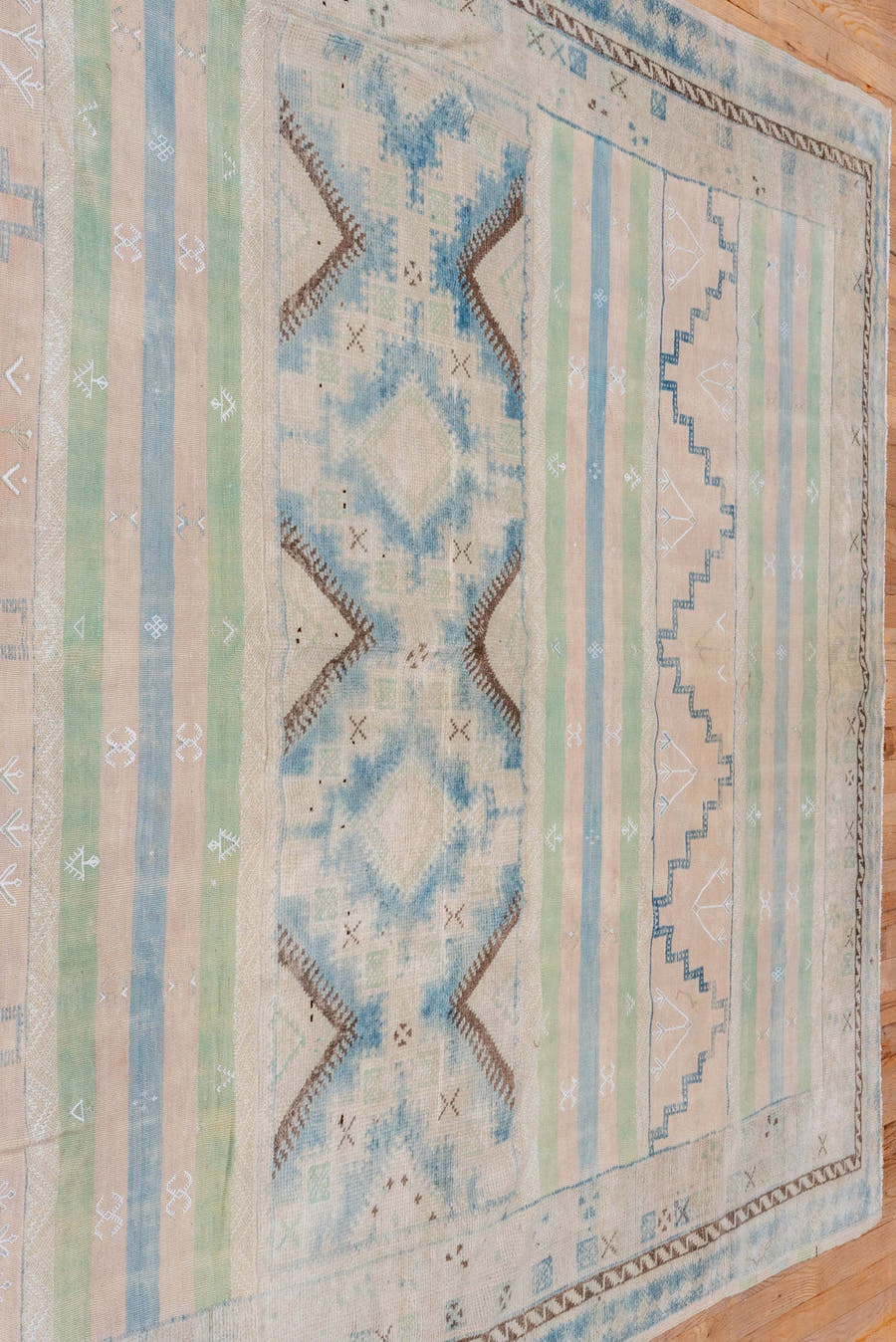 6' x 9' one-of-a-kind handmade antique Moroccan medium size rug. Color palette: ivory, pale blue, sage, blush, taupe, brown