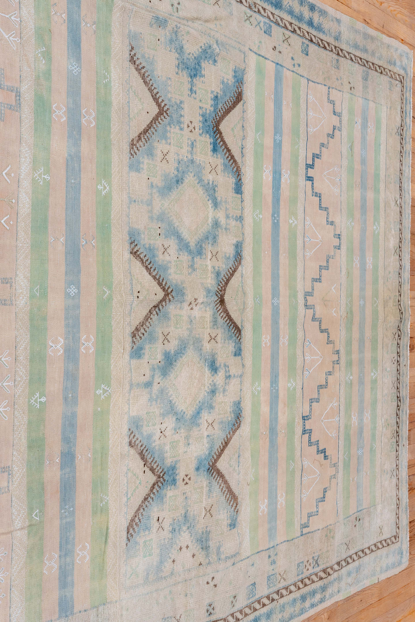 6' x 9' one-of-a-kind handmade antique Moroccan medium size rug. Color palette: ivory, pale blue, sage, blush, taupe, brown