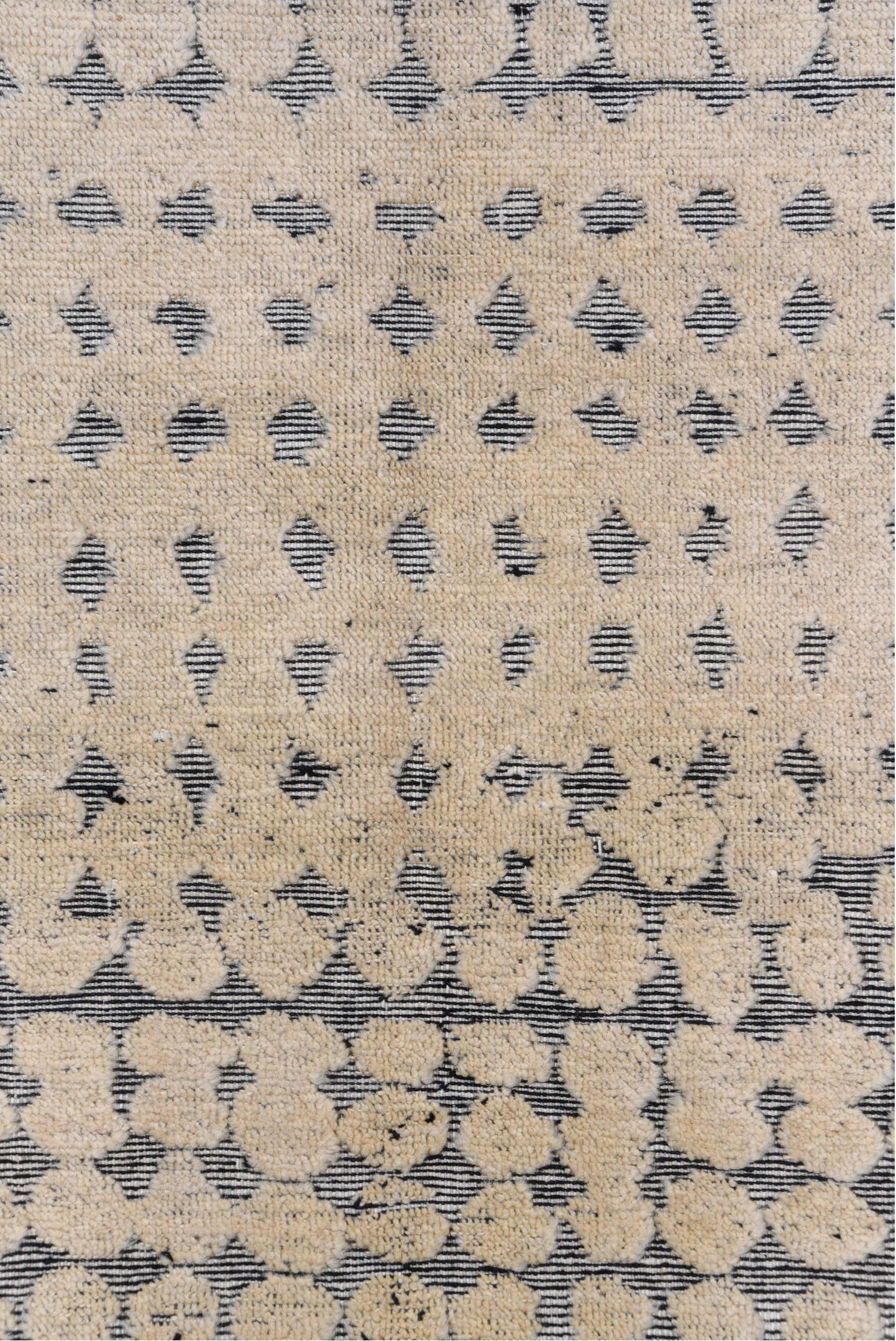 5' x 8' one-of-a-kind handmade handmade Modern medium size rug. Color palette: ivory, slate, gray, charcoal, black