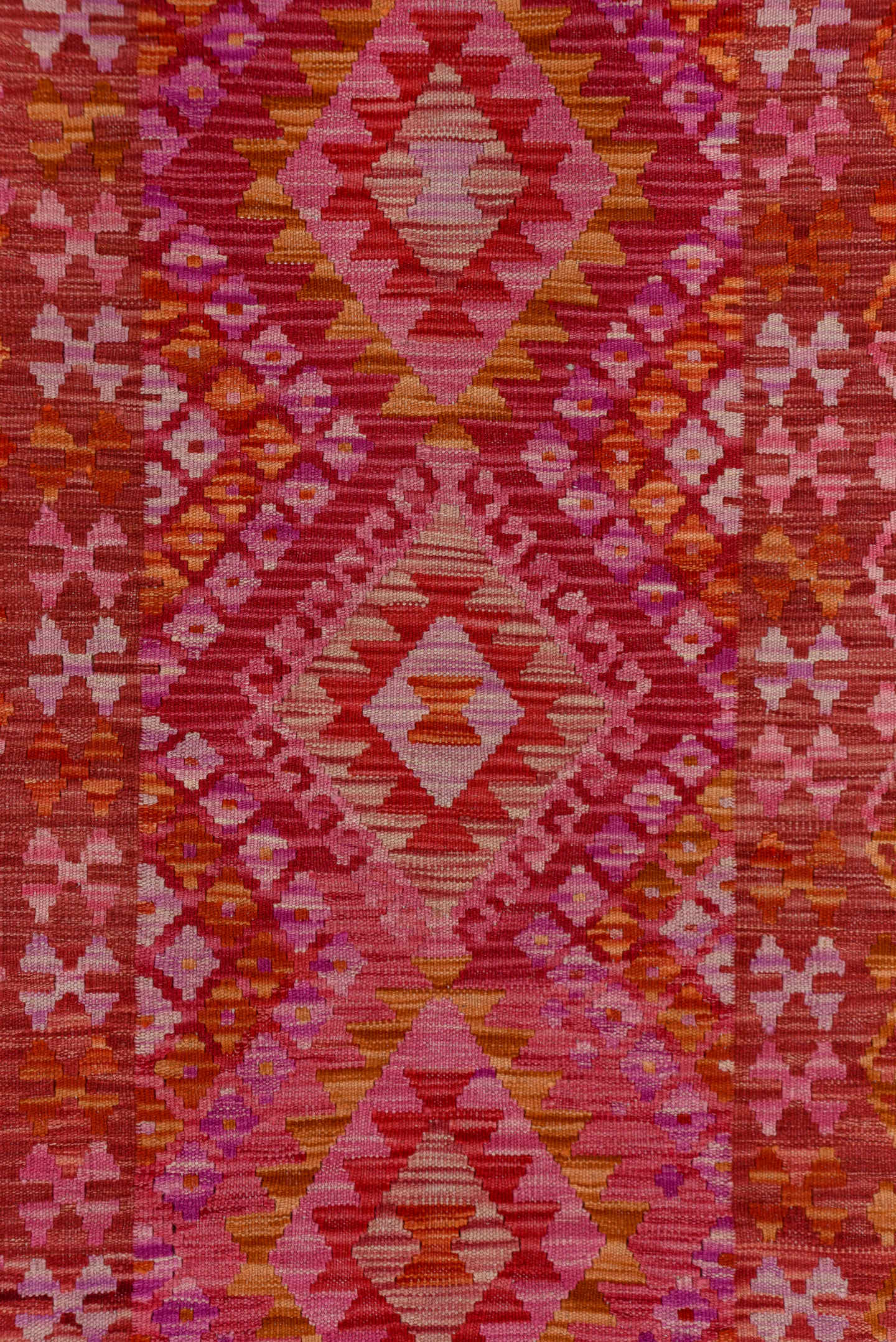 2' x 9' one-of-a-kind handmade vintage Kilim runner rug. Color palette: rose, pink, rust, magenta, terra cotta, ivory