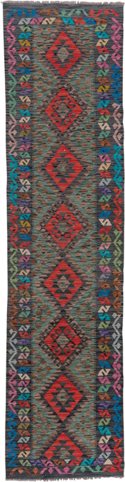 2' x 9' one-of-a-kind handmade vintage Kilim runner rug. Color palette: charcoal, crimson, turquoise, coral, ivory, lavender