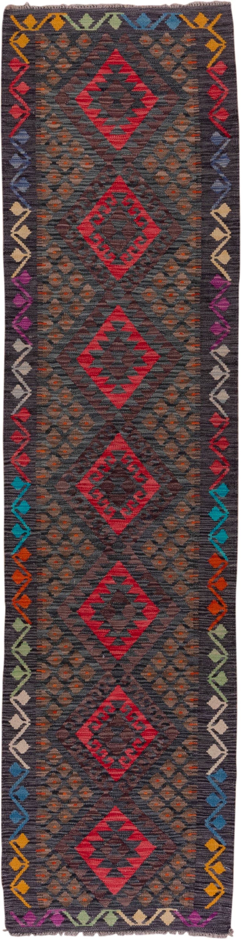 2' x 9' one-of-a-kind handmade vintage Kilim runner rug. Color palette: charcoal, crimson, rust, turquoise, ivory, gold