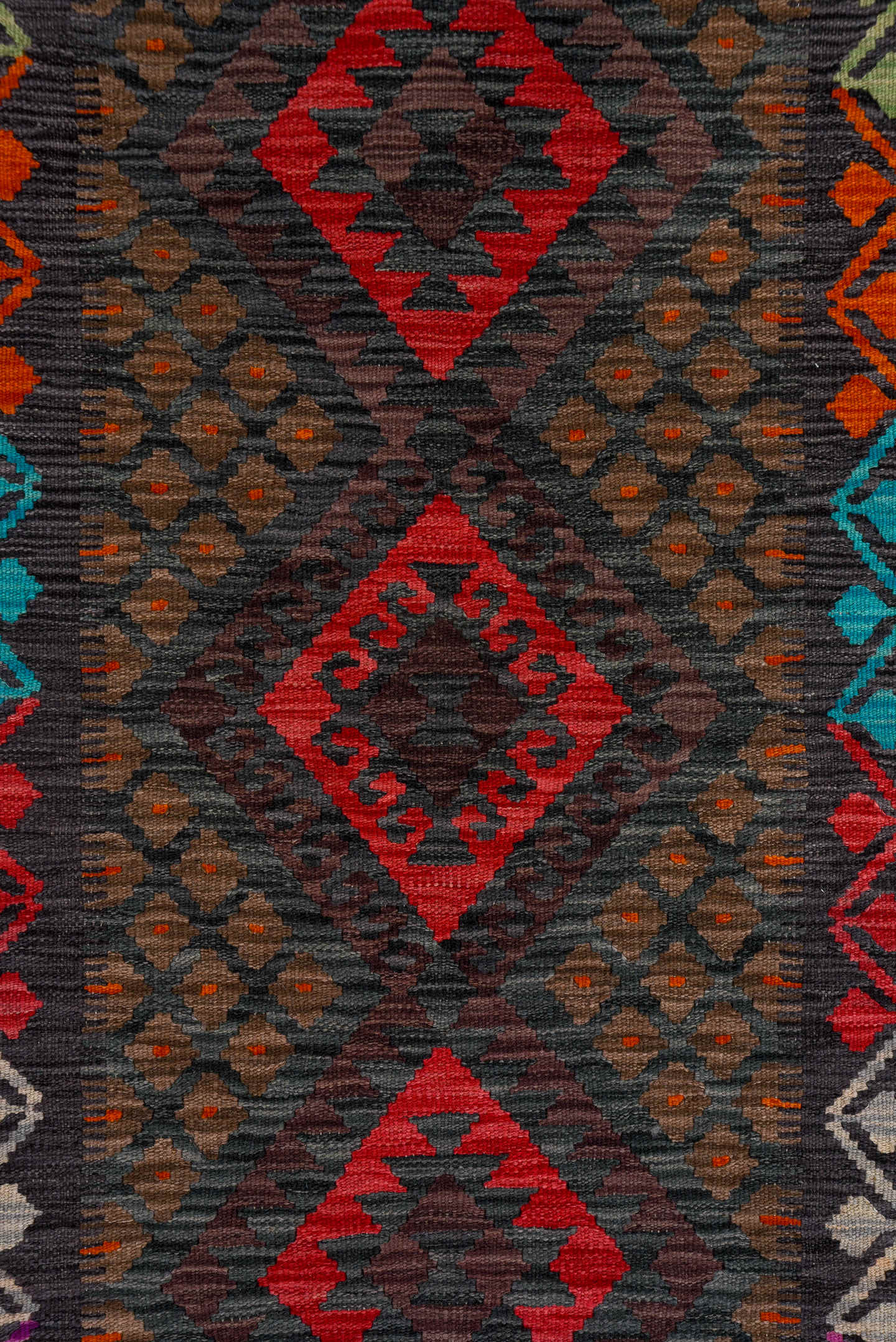 2' x 9' one-of-a-kind handmade vintage Kilim runner rug. Color palette: charcoal, crimson, rust, turquoise, ivory, gold