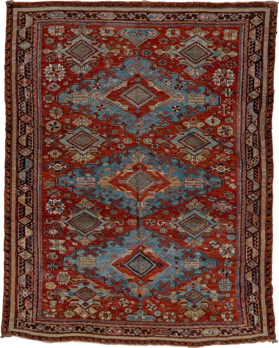 6' x 8' one-of-a-kind handmade antique Sumak medium size rug. Color palette: rust, sky blue, ivory, charcoal, camel