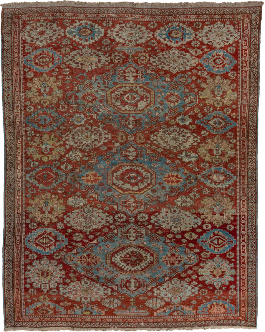 7' x 9' one-of-a-kind handmade antique Sumak rug. Color palette: rust, sky blue, ivory, beige, gold, brick, taupe