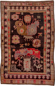 5' x 8' one-of-a-kind handmade antique Khotan medium size rug. Color palette: charcoal, camel, ivory, rose, rust, taupe