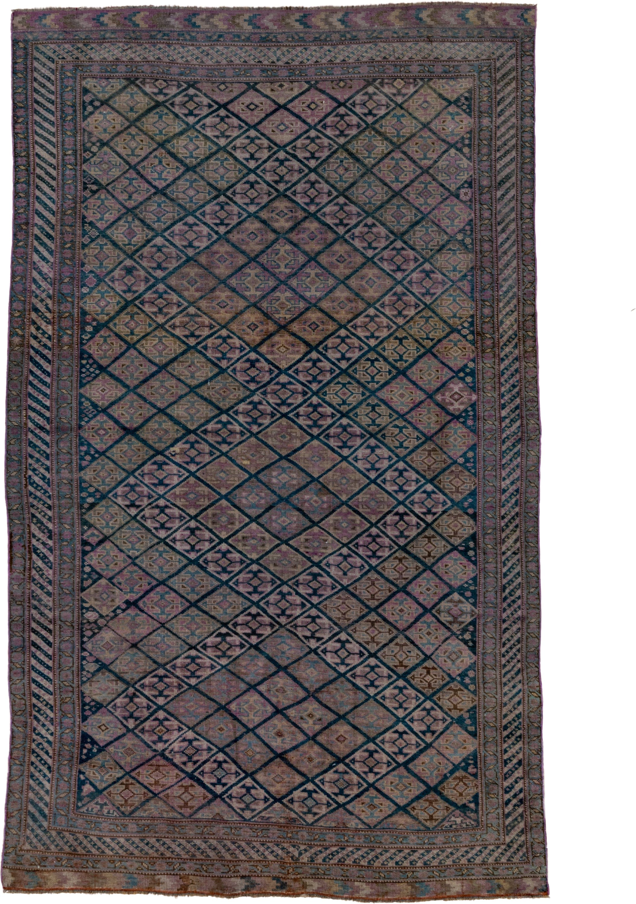 4' x 7' one-of-a-kind handmade antique Qashqai rug. Color palette: taupe, indigo, mauve, dusty rose, ivory, slate, camel