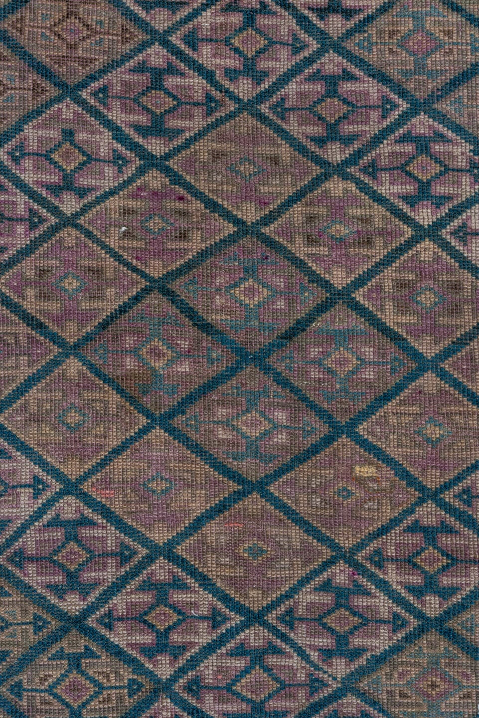 4' x 7' one-of-a-kind handmade antique Qashqai rug. Color palette: taupe, indigo, mauve, dusty rose, ivory, slate, camel