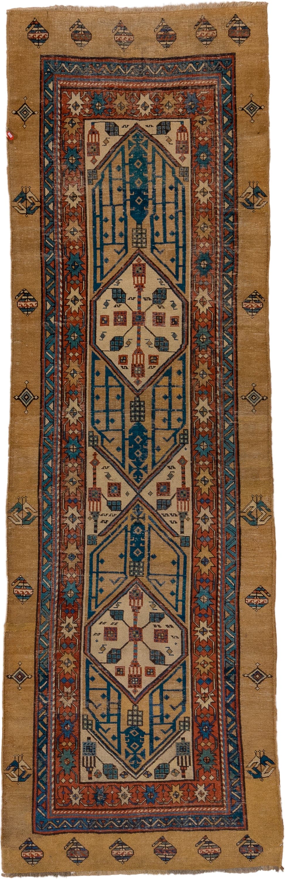 3' x 10' one-of-a-kind handmade antique Sarab runner rug. Color palette: camel, indigo, ivory, rust, terra cotta, navy