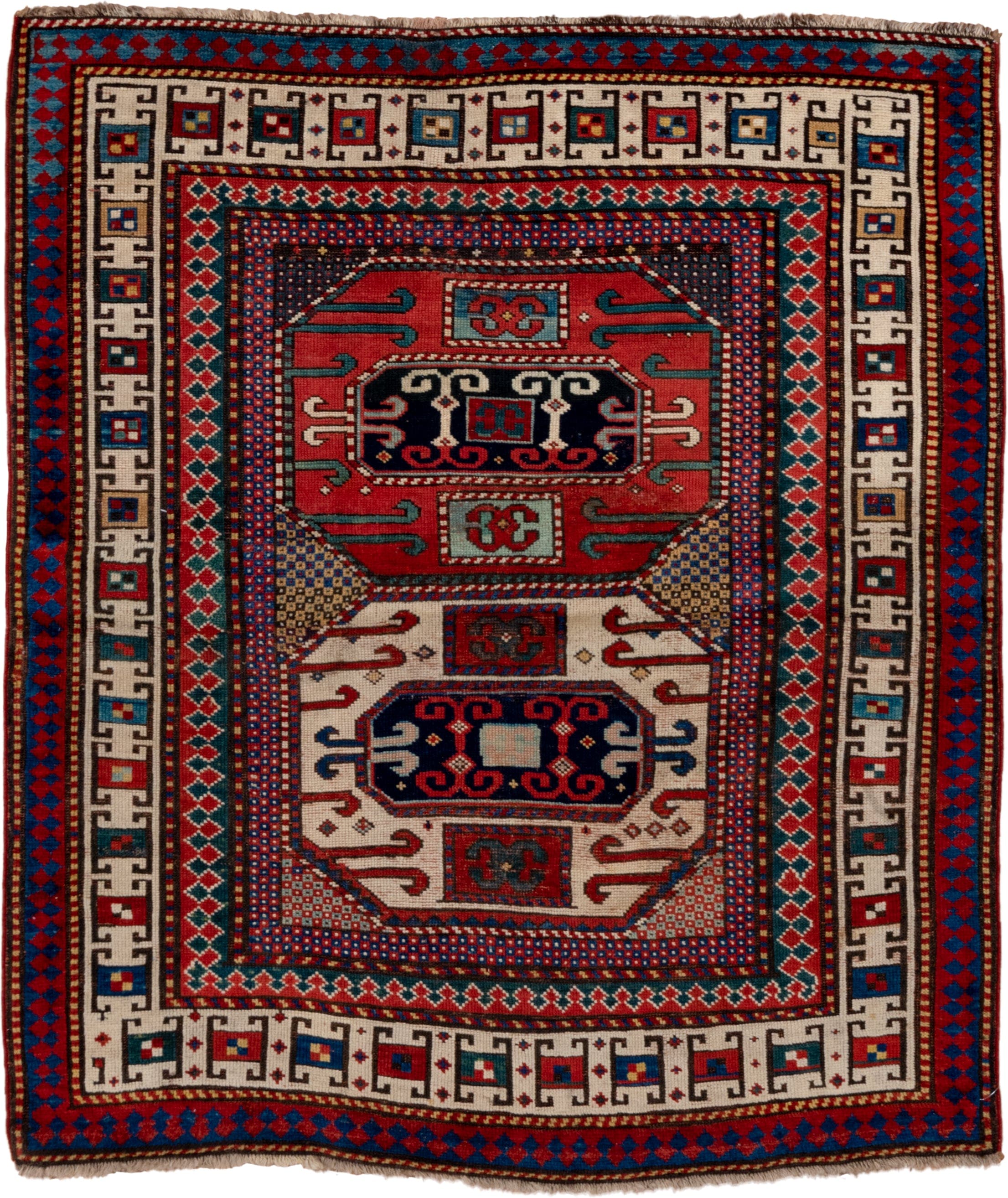 4' x 4' one-of-a-kind handmade antique Kazak small size rug. Color palette: ivory, red, navy, cobalt, teal, crimson, camel