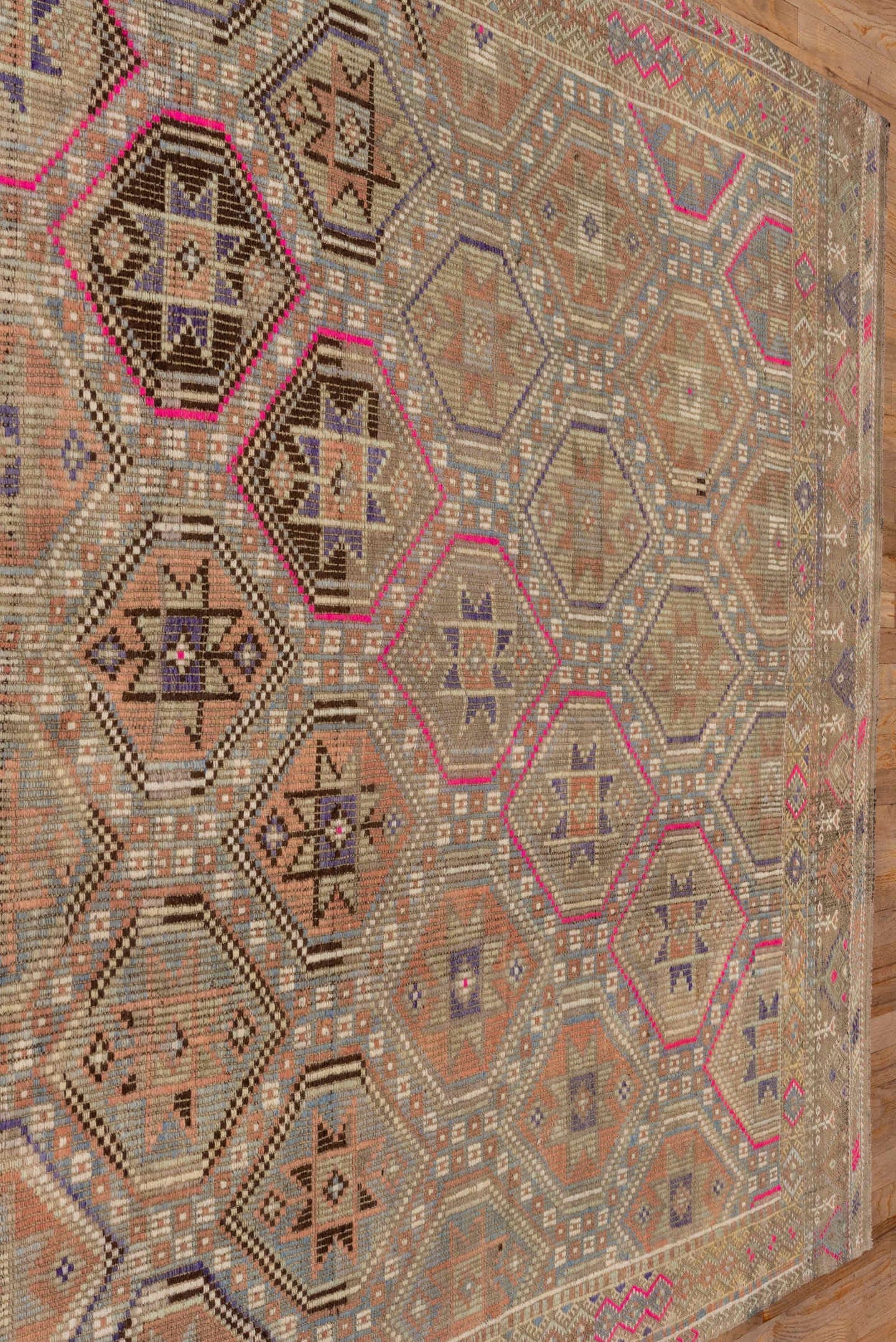 6' x 9' one-of-a-kind handmade antique Jijim medium size rug. Color palette: camel, taupe, rose, ivory, slate, violet, sand
