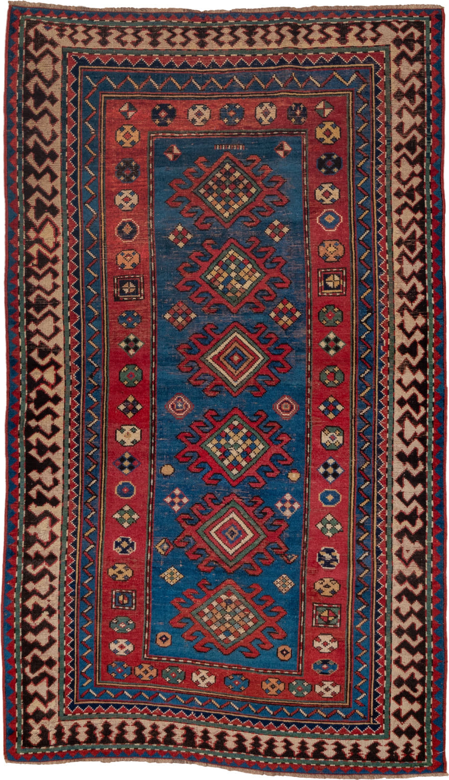 3' x 6' one-of-a-kind handmade antique Kazak small size rug. Color palette: blue, rust, ivory, navy, crimson, gold, teal