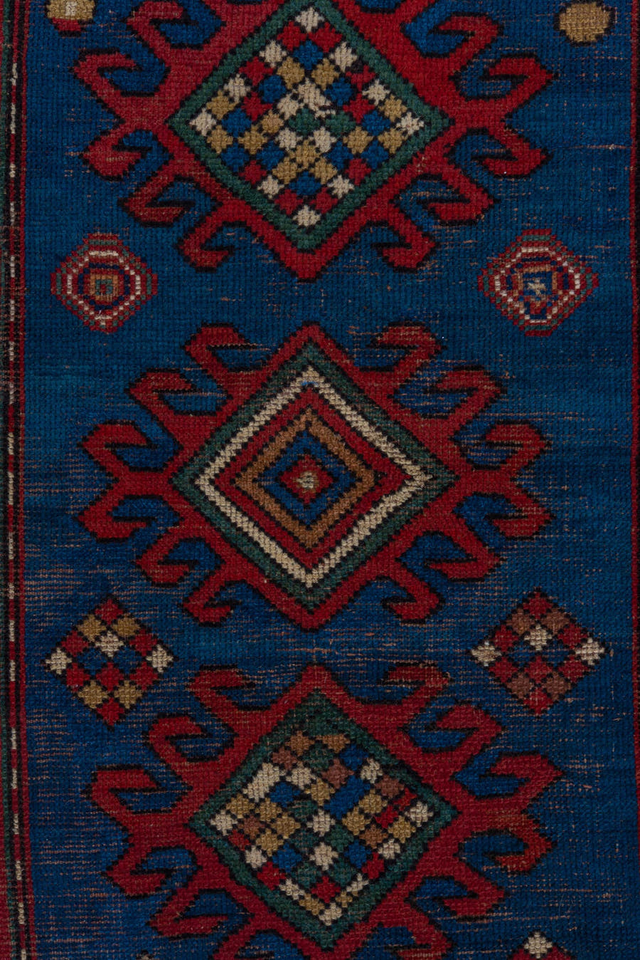 3' x 6' one-of-a-kind handmade antique Kazak small size rug. Color palette: blue, rust, ivory, navy, crimson, gold, teal