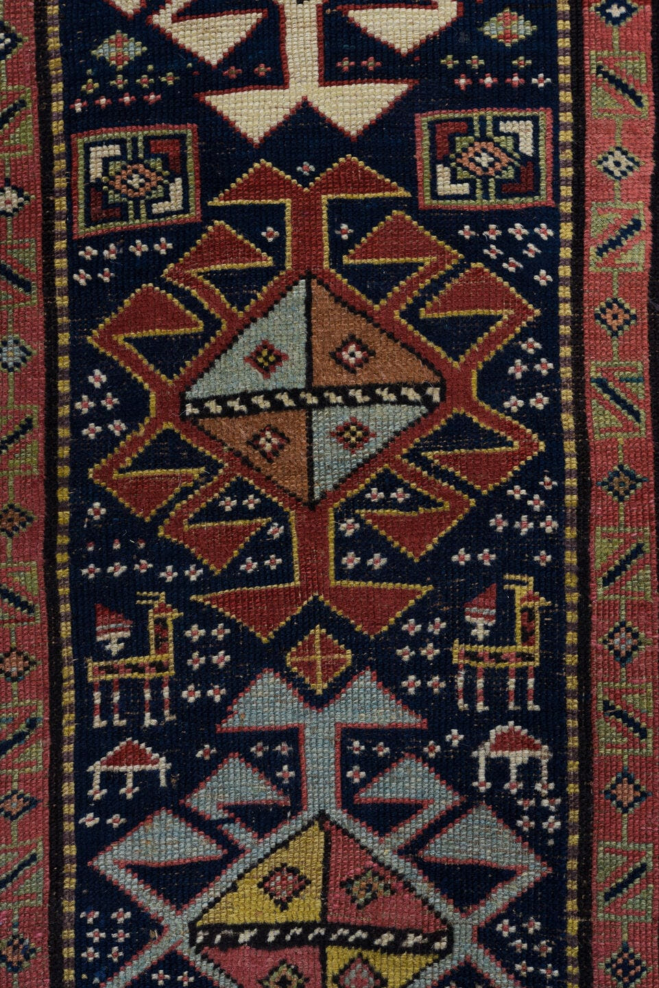 3' x 11' one-of-a-kind handmade vintage Caucasian runner rug. Color palette: navy, ivory, rust, rose, soft blue, taupe