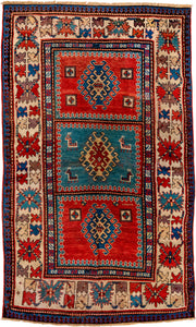 4' x 7' one-of-a-kind handmade antique Kazak rug. Color palette: ivory, red, sky blue, navy, rust, taupe, teal, light blue