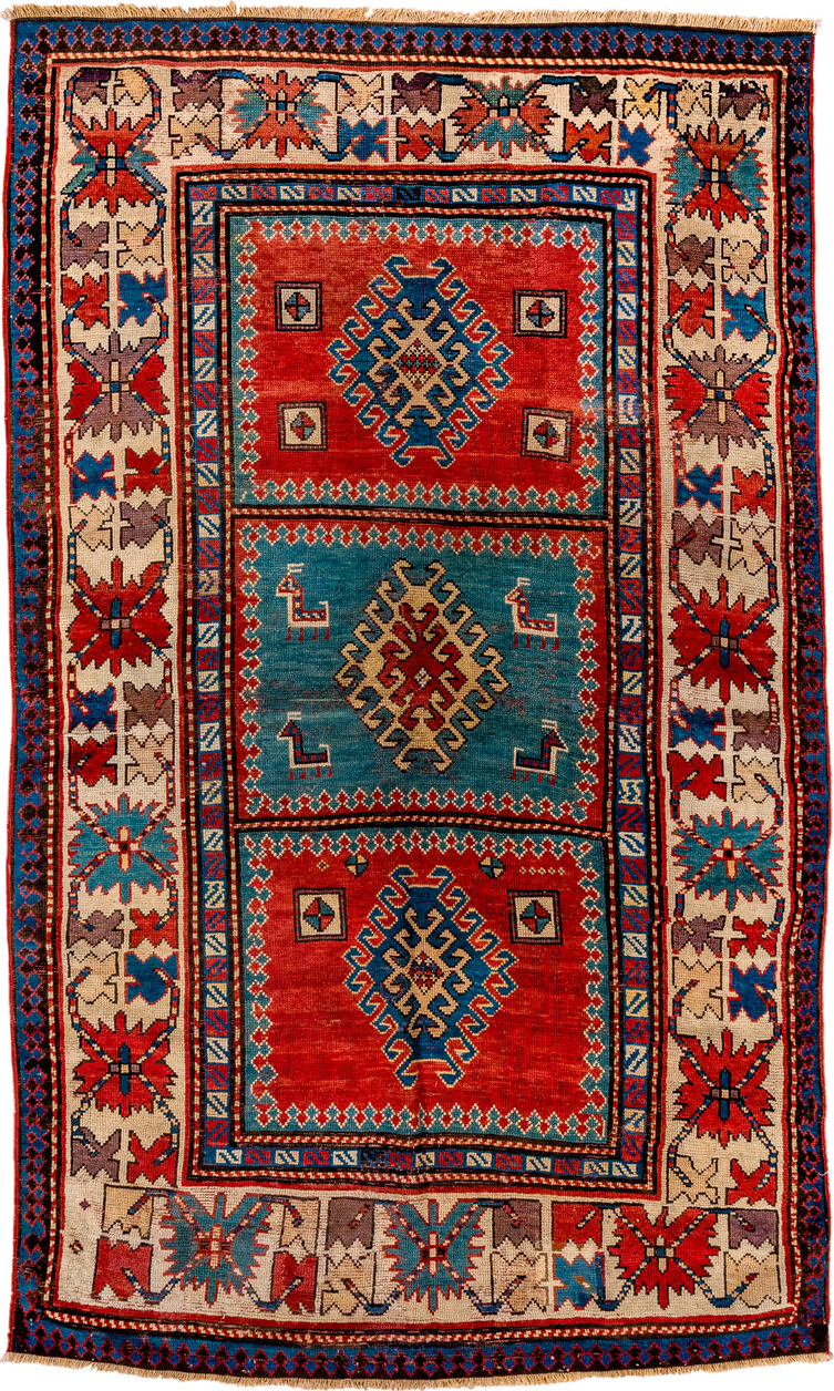 4' x 7' one-of-a-kind handmade antique Kazak rug. Color palette: ivory, red, sky blue, navy, rust, taupe, teal, light blue