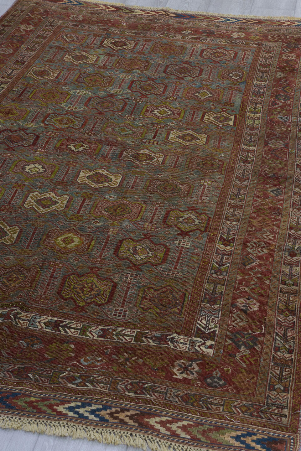 4' x 7' one-of-a-kind handmade vintage Afshar rug. Color palette: rust, slate, ivory, camel, burgundy, navy, taupe