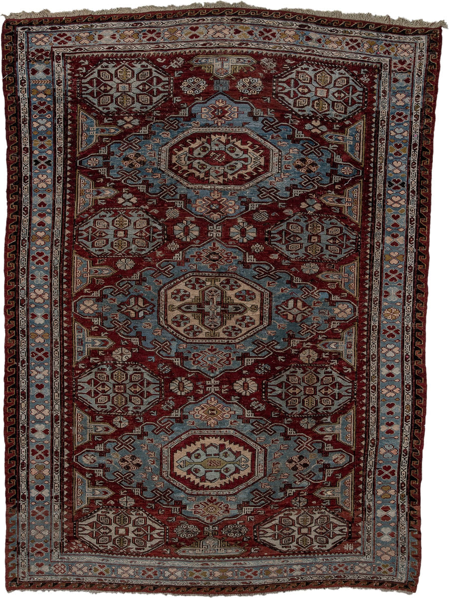 4' x 6' one-of-a-kind handmade antique Sumak rug. Color palette: rust, powder blue, ivory, charcoal, burgundy, camel, slate