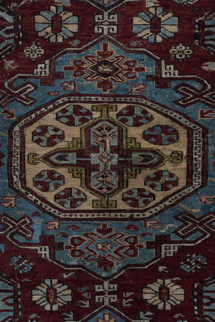 4' x 6' one-of-a-kind handmade antique Sumak rug. Color palette: rust, powder blue, ivory, charcoal, burgundy, camel, slate