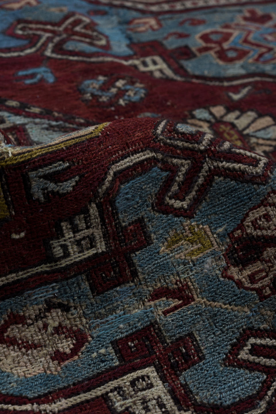 4' x 6' one-of-a-kind handmade antique Sumak rug. Color palette: rust, powder blue, ivory, charcoal, burgundy, camel, slate