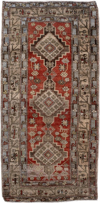 3' x 7' one-of-a-kind handmade antique Heriz rug. Color palette: rust, ivory, taupe, slate, charcoal, camel, crimson