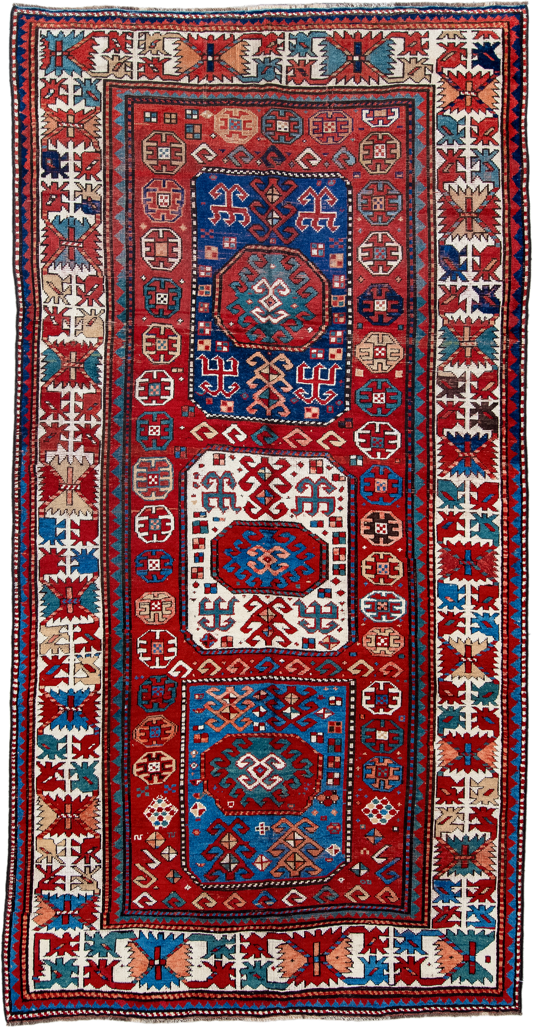 5' x 10' one-of-a-kind handmade antique Kazak medium size rug. Color palette: red, ivory, blue, teal, navy, rust, cream