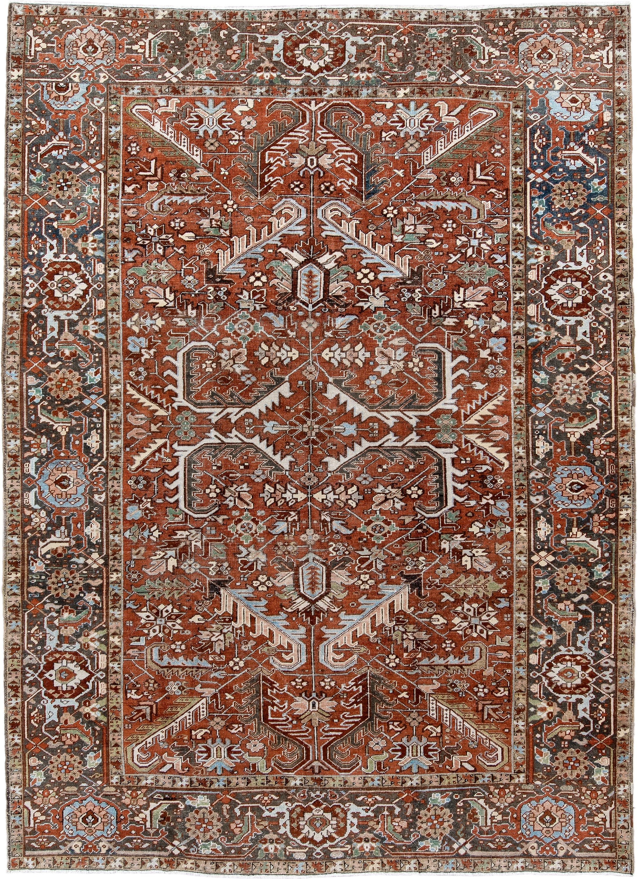 7' x 10' one-of-a-kind handmade antique Heriz large size rug. Color palette: rust, charcoal, ivory, sky_blue, sage, taupe