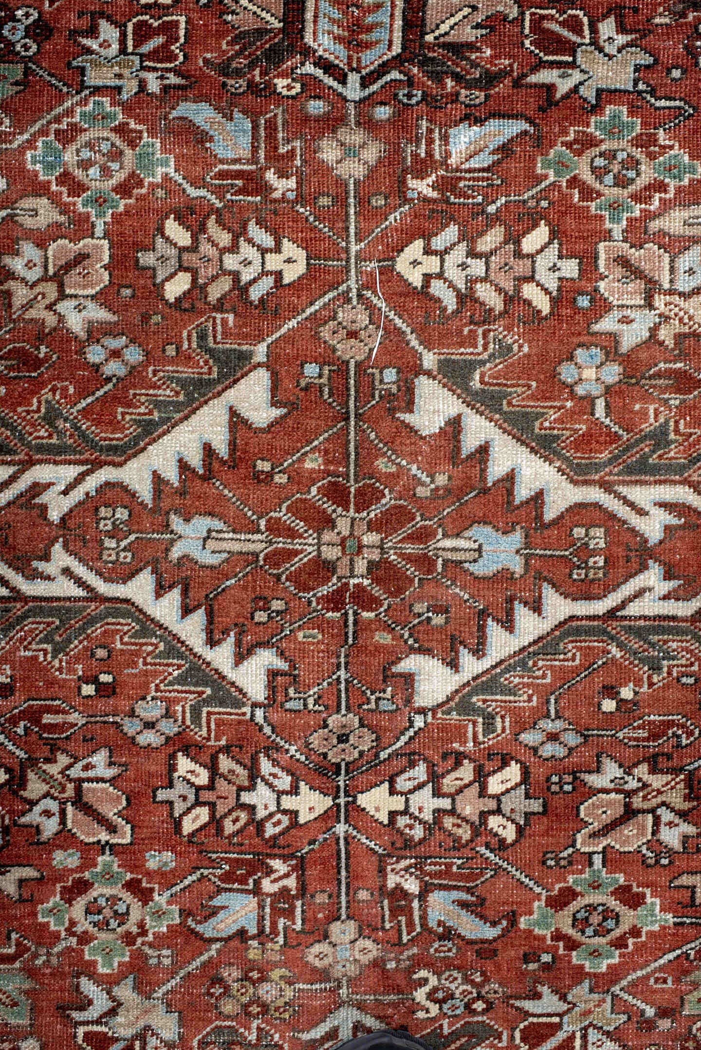 7' x 10' one-of-a-kind handmade antique Heriz large size rug. Color palette: rust, charcoal, ivory, sky_blue, sage, taupe