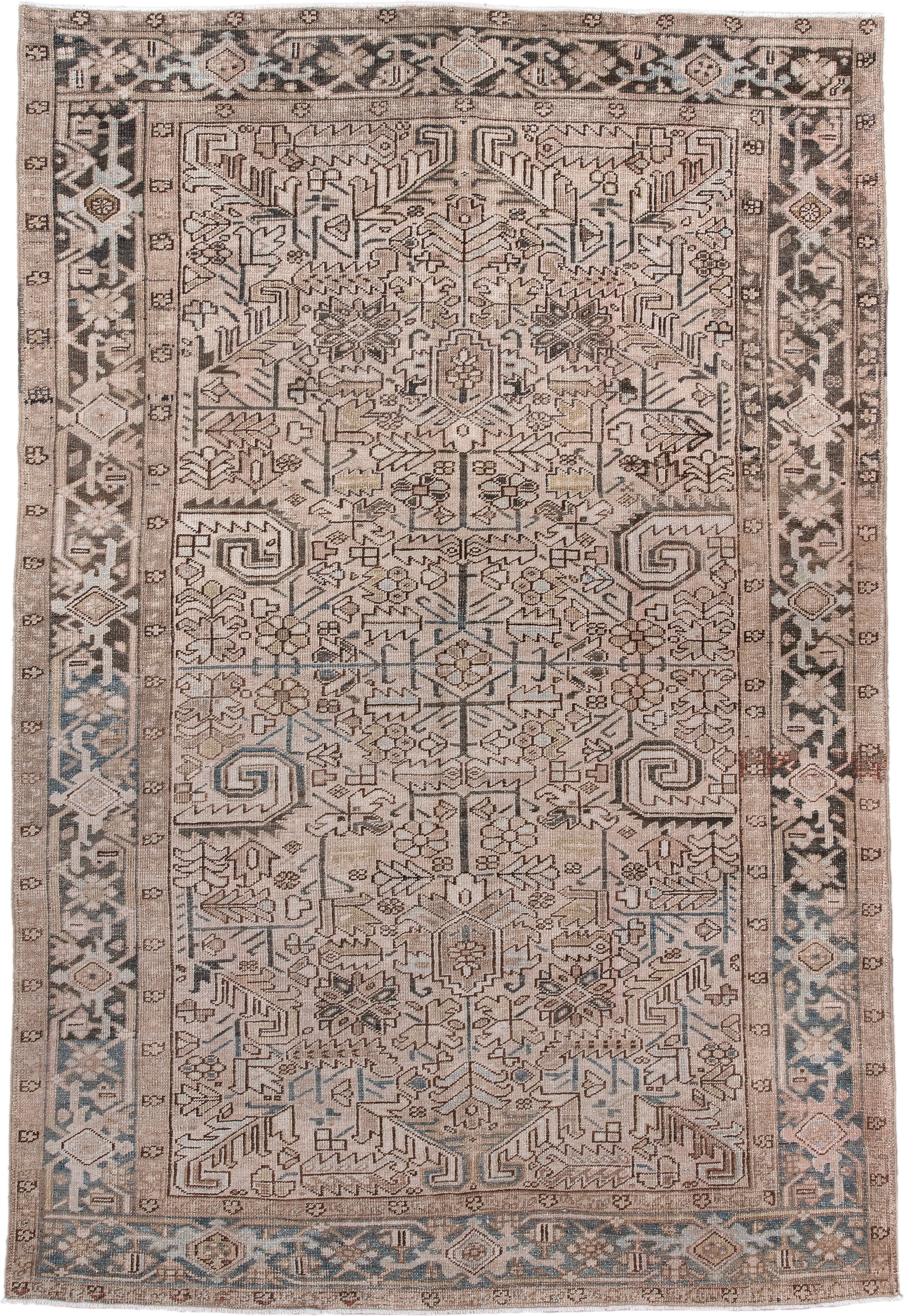 6' x 9' one-of-a-kind handmade antique Heriz medium size rug. Color palette: ivory, taupe, slate, charcoal, camel