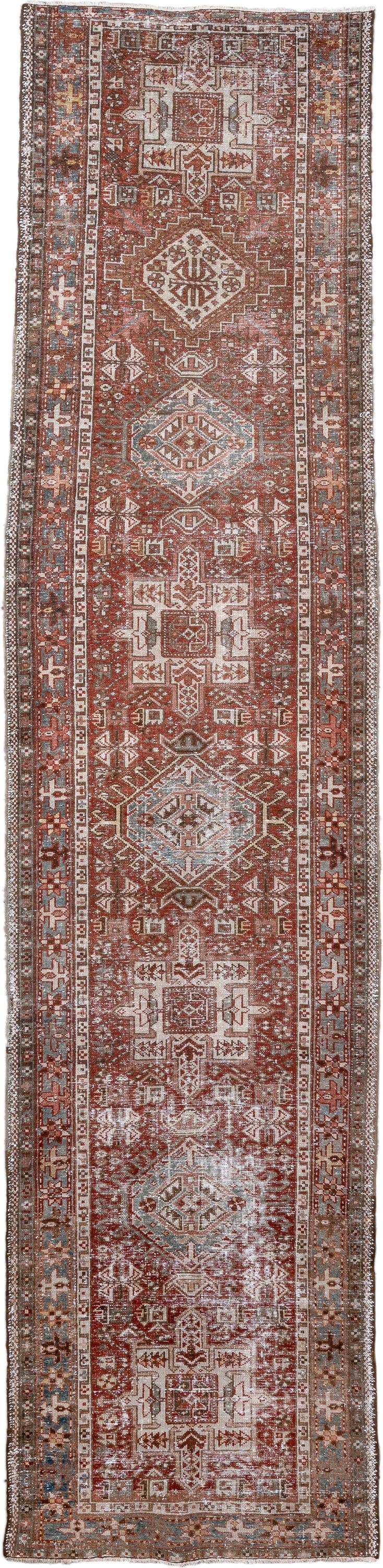 2' x 11' one-of-a-kind handmade antique Karaje runner rug. Color palette: rust, ivory, soft blue, terra cotta, brown, slate