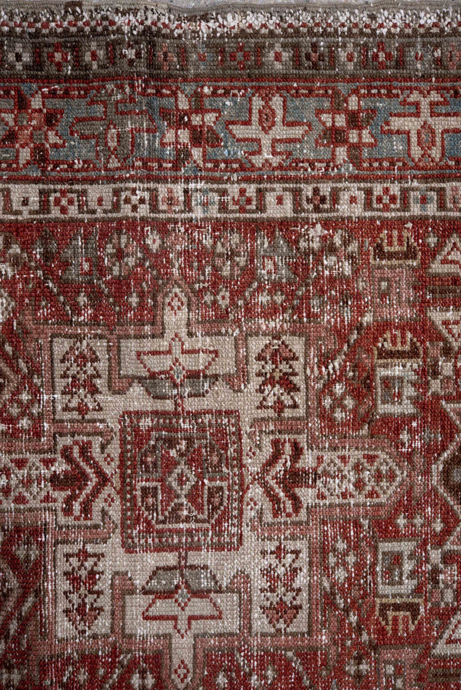2' x 11' one-of-a-kind handmade antique Karaje runner rug. Color palette: rust, ivory, soft blue, terra cotta, brown, slate