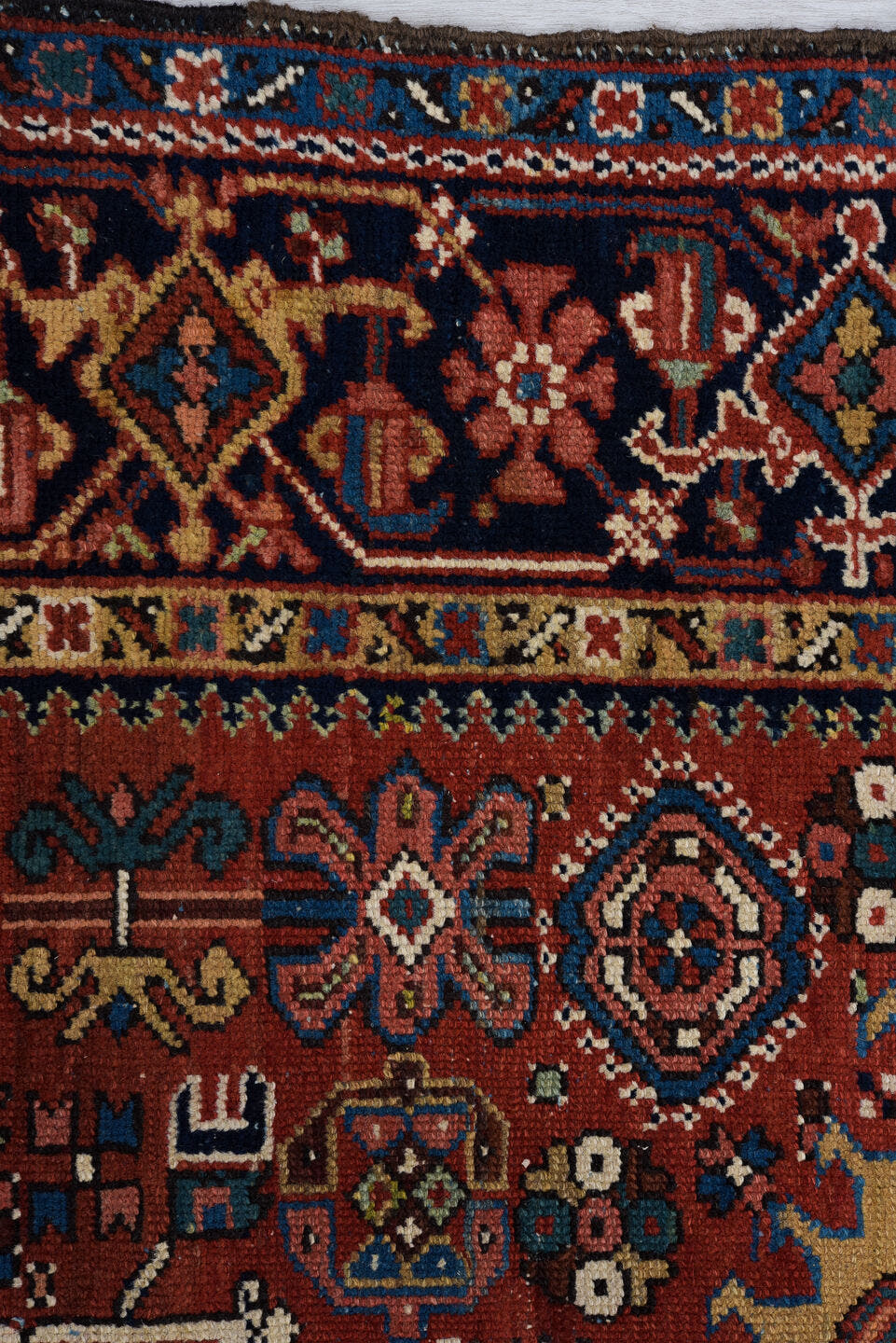 4' x 6' one-of-a-kind handmade vintage Karaje small size rug. Color palette: rust, navy, ivory, sky_blue, camel, rose