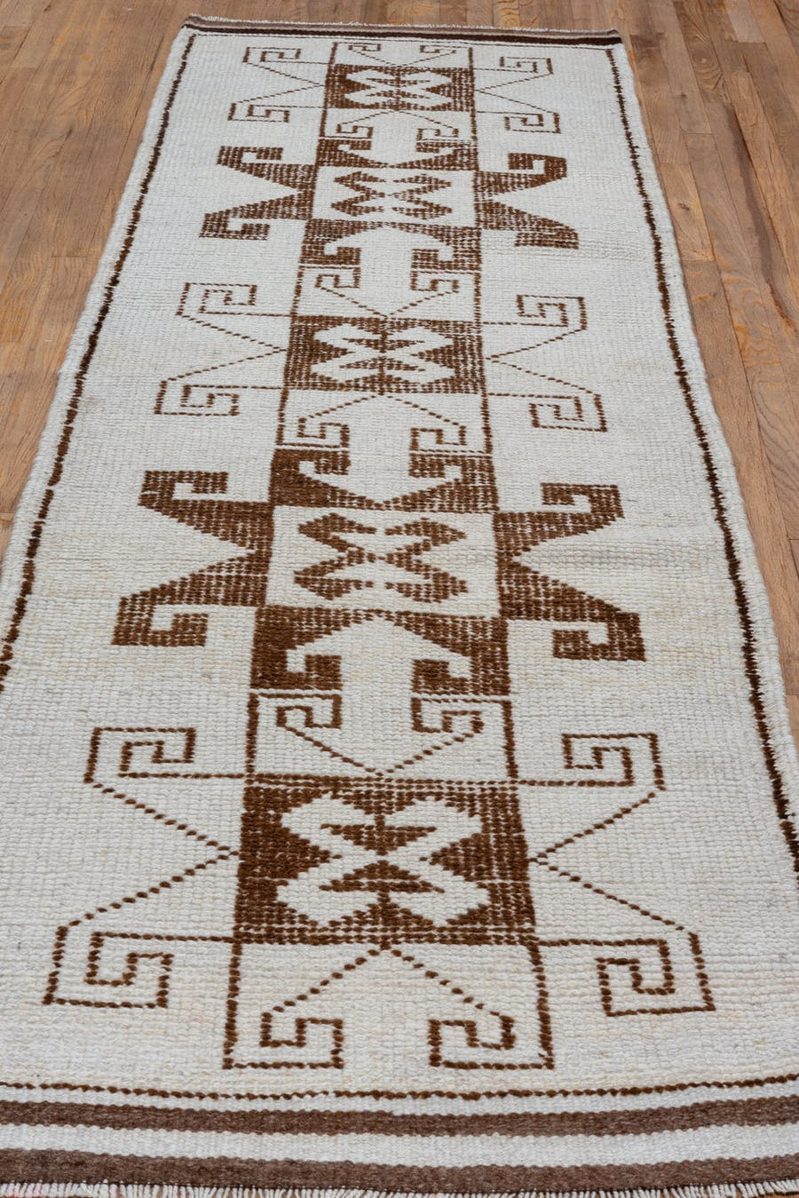 3' x 10' one-of-a-kind handmade antique Kars runner rug. Color palette: ivory, brown, taupe, beige, gray