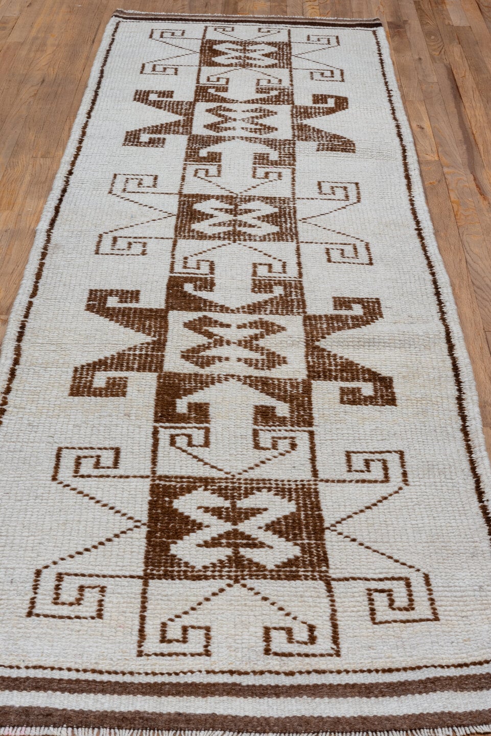 3' x 10' one-of-a-kind handmade antique Kars runner rug. Color palette: ivory, brown, taupe, beige, gray