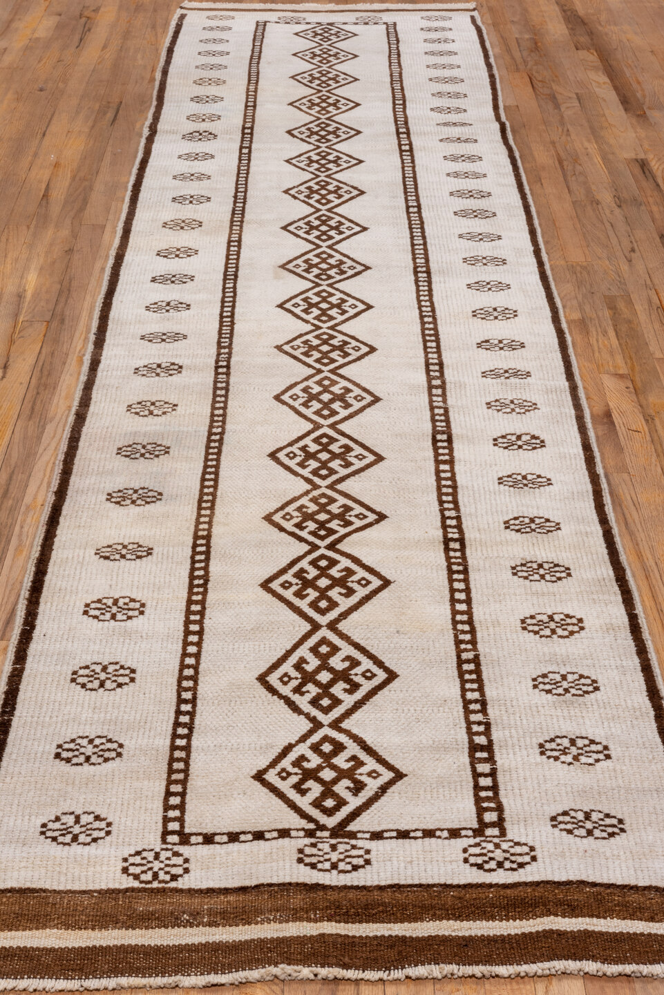 3' x 13' one-of-a-kind handmade antique Kars runner rug. Color palette: ivory, brown, taupe, beige, gray
