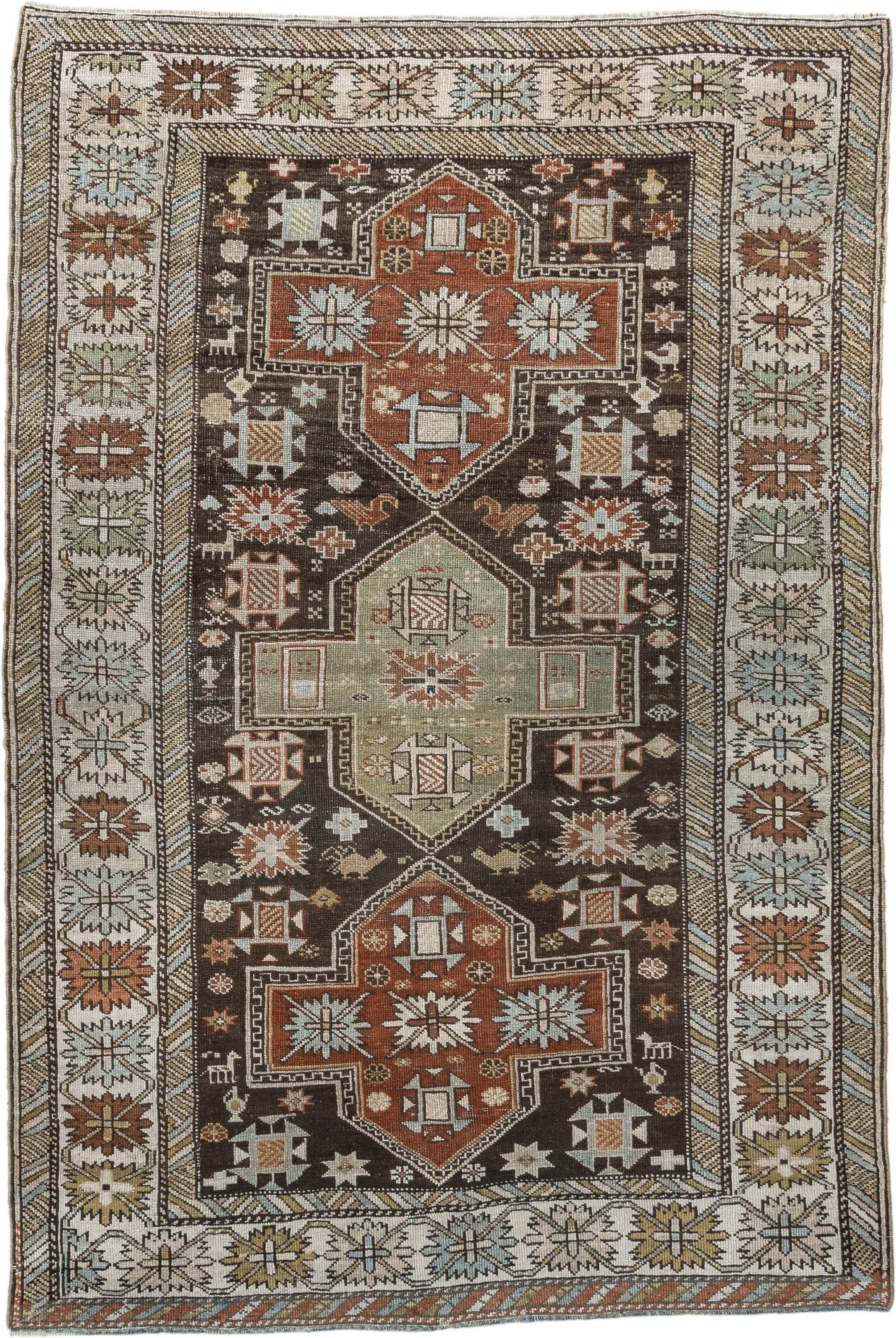 3' x 5' one-of-a-kind handmade antique Shirvan small size rug. Color palette: ivory, dark brown, rust, pale sage, sky blue