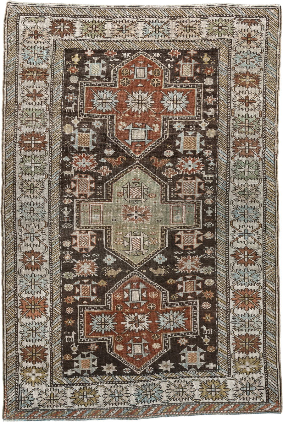 3' x 5' one-of-a-kind handmade antique Shirvan small size rug. Color palette: ivory, dark brown, rust, pale sage, sky blue