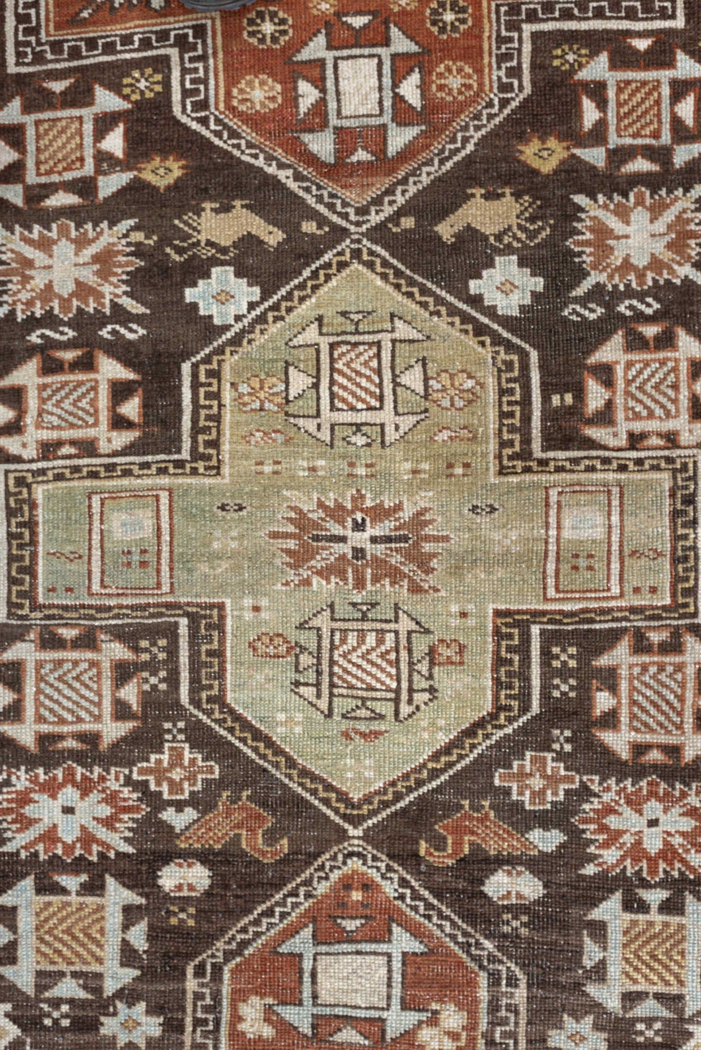3' x 5' one-of-a-kind handmade antique Shirvan small size rug. Color palette: ivory, dark brown, rust, pale sage, sky blue